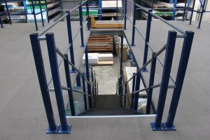 mezzanine floor completed with a staircase and pedestrian barriers